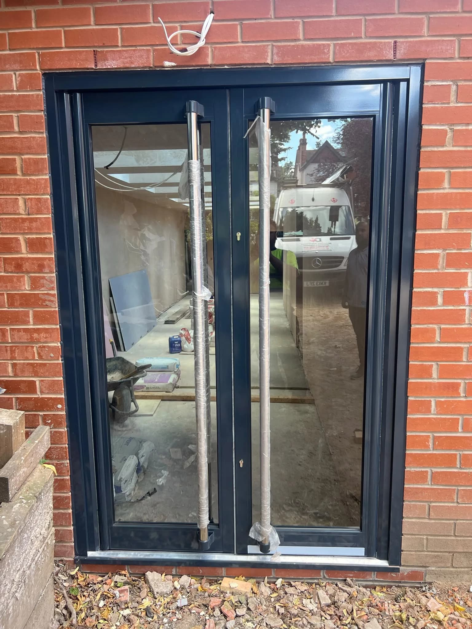 Bi-Fold Door System